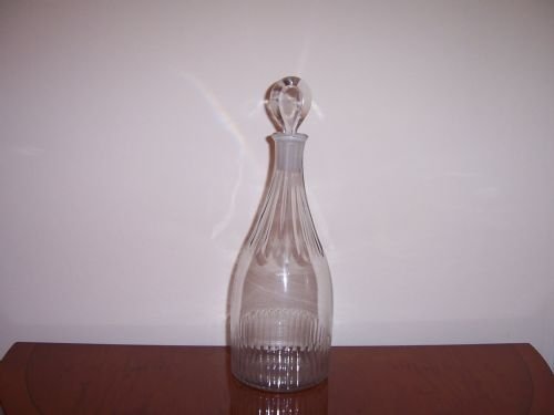 an 18th century glass taper neck decanter