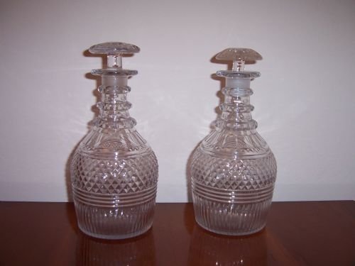 a good pair of georgian cut glass decanters