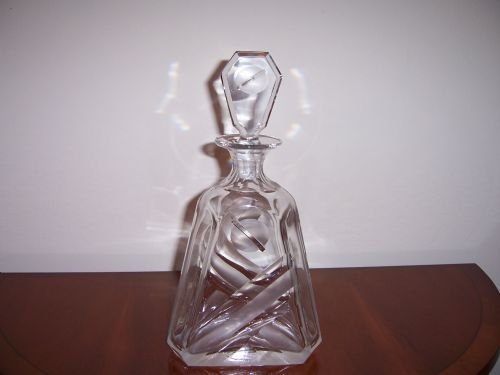 a stylish art deco cut and frosted glass decanter