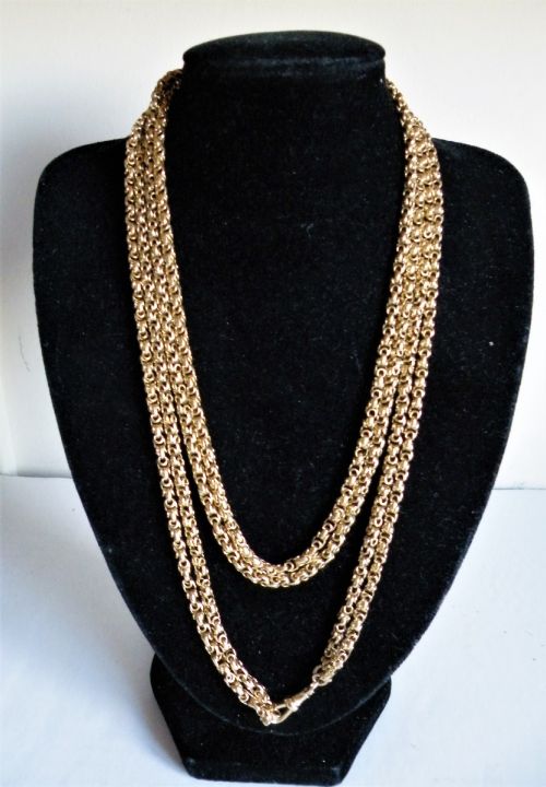 a superb and heavy victorian 9 carat gold long guard muff chain 665 grams