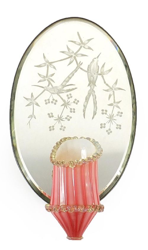 a pretty victorian oval wall mirror with posy vase the mirror engraved with birds