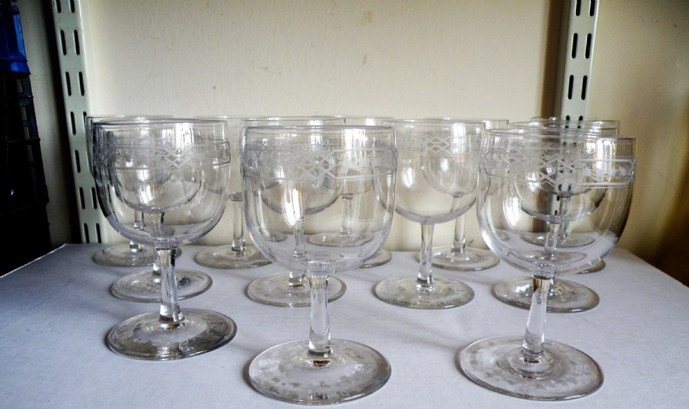 a rare set of twelve georgian engraved port wine glasses