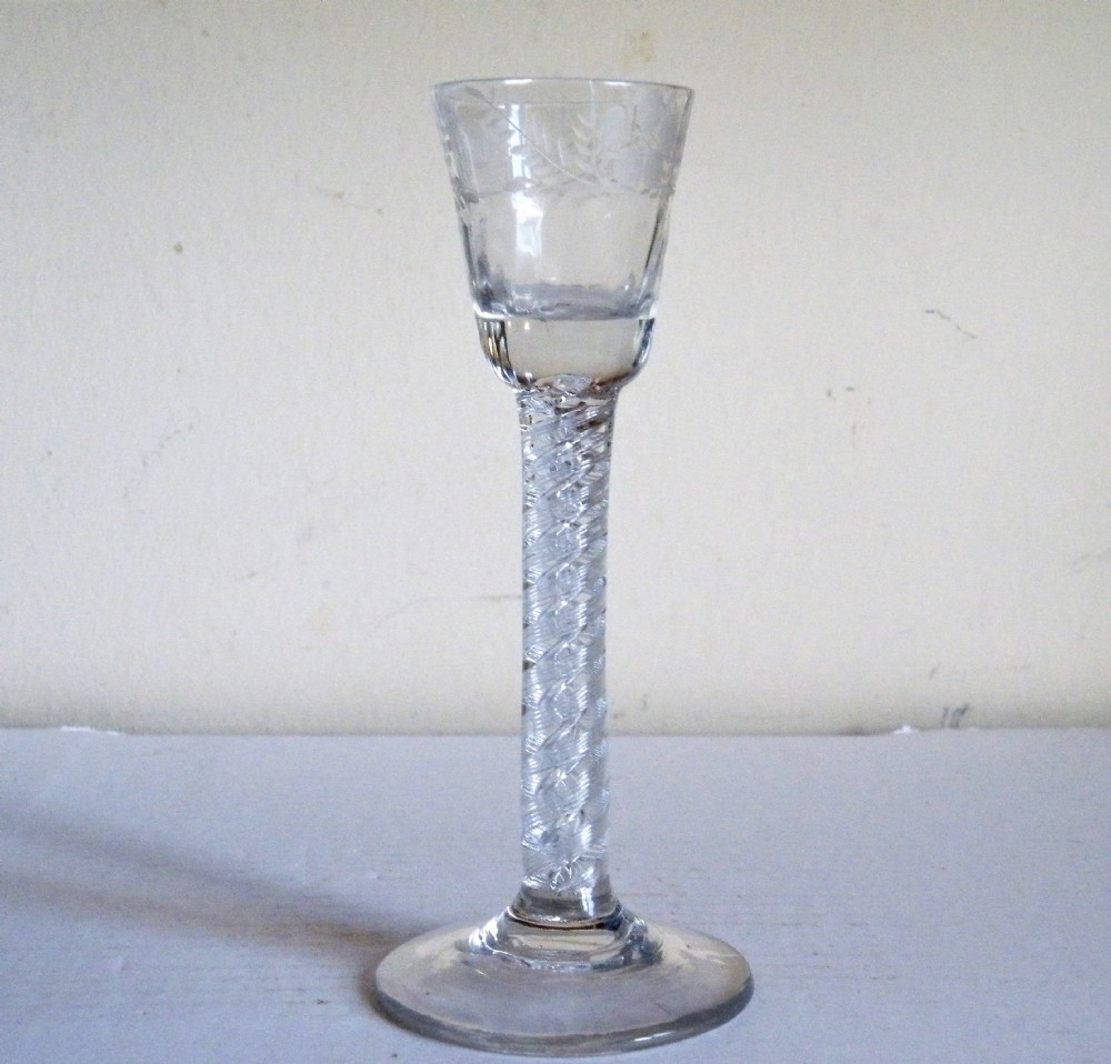 a rare irish 18th century georgian air twist stem engraved cordial glass