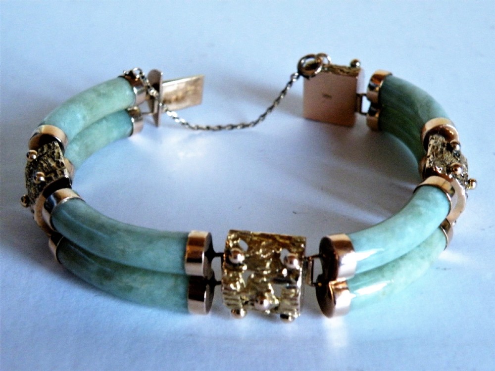 a late 19th early 20th century chinese jade and 14 carat gold bracelet