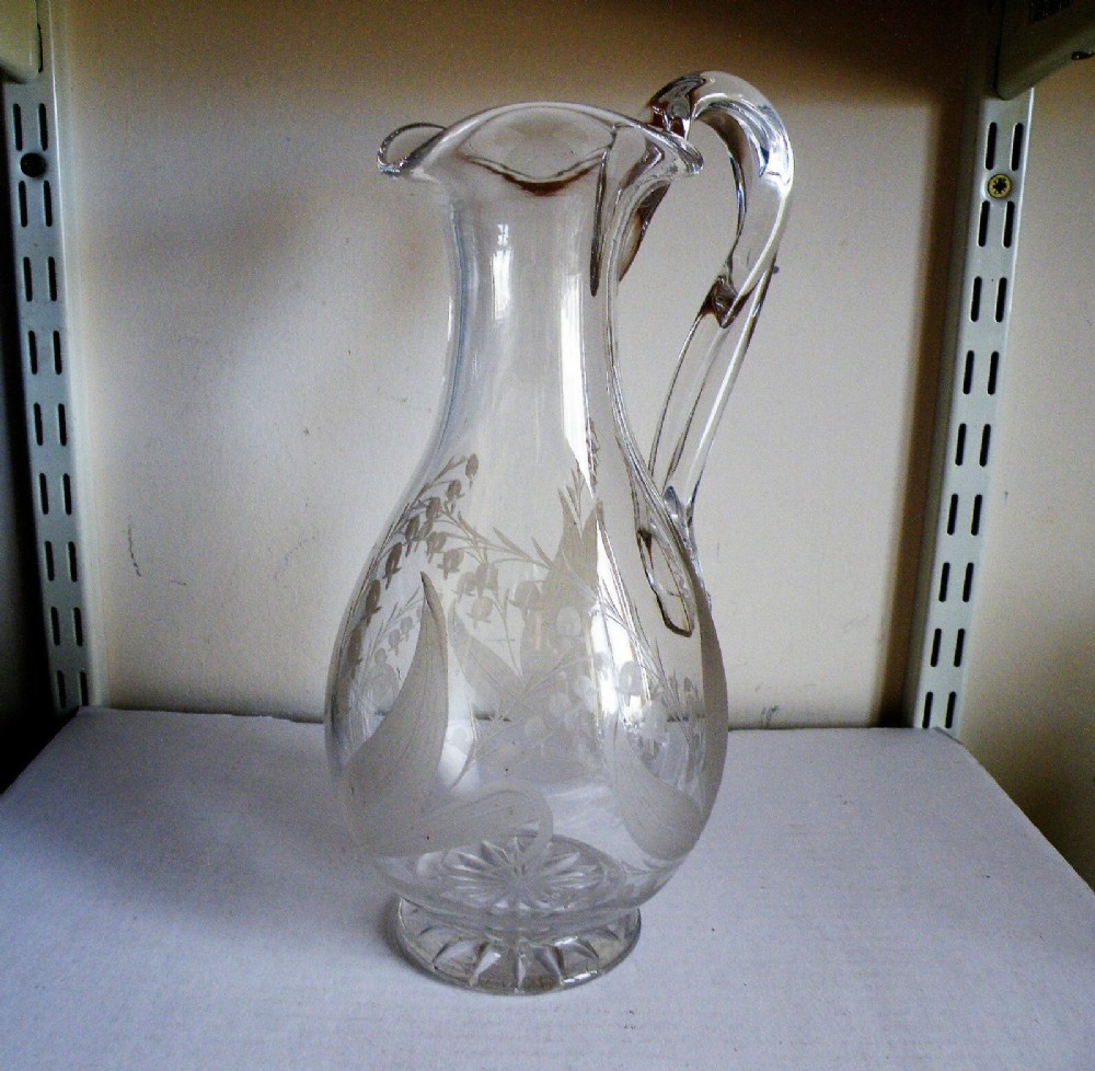 a good early 19th century engraved glass jug by richardson
