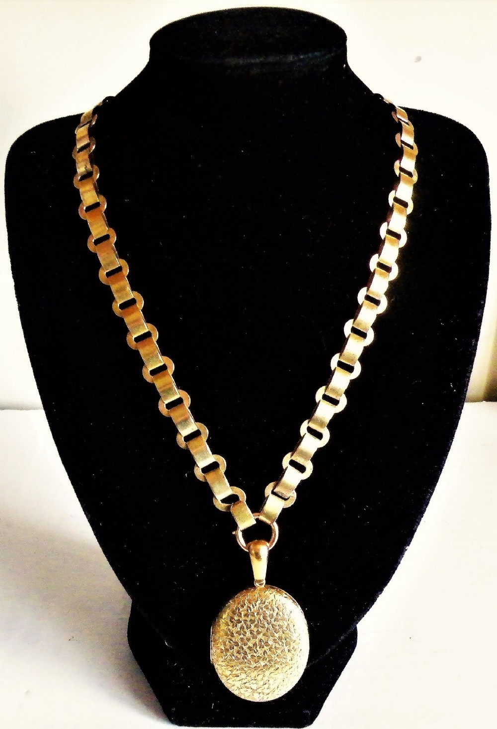 a good victorian 15 carat solid gold locket and chain