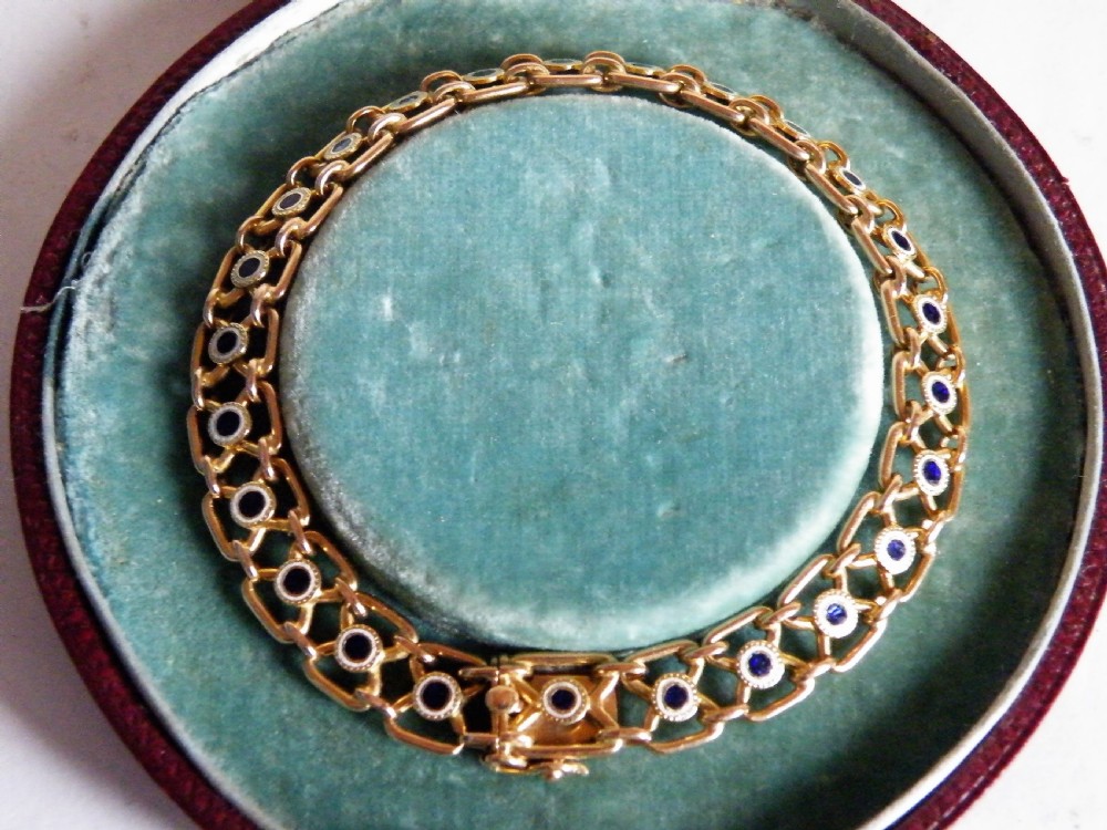 a good antique gold and enamel bracelet
