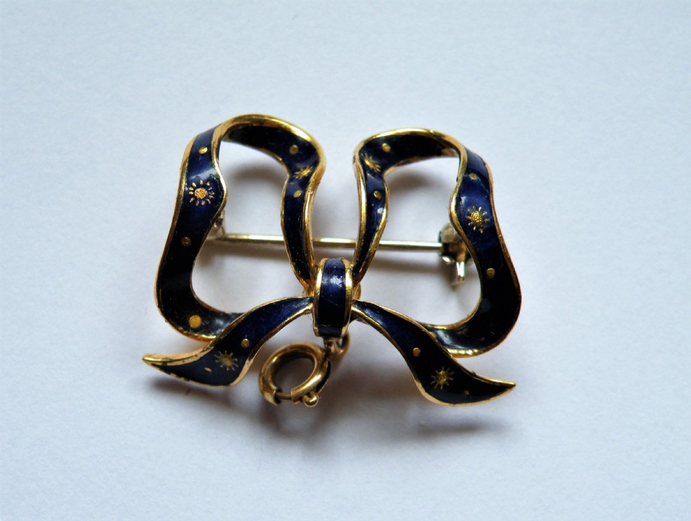 an antique 18 carat gold and enamel fob watch nurses watch suspender brooch