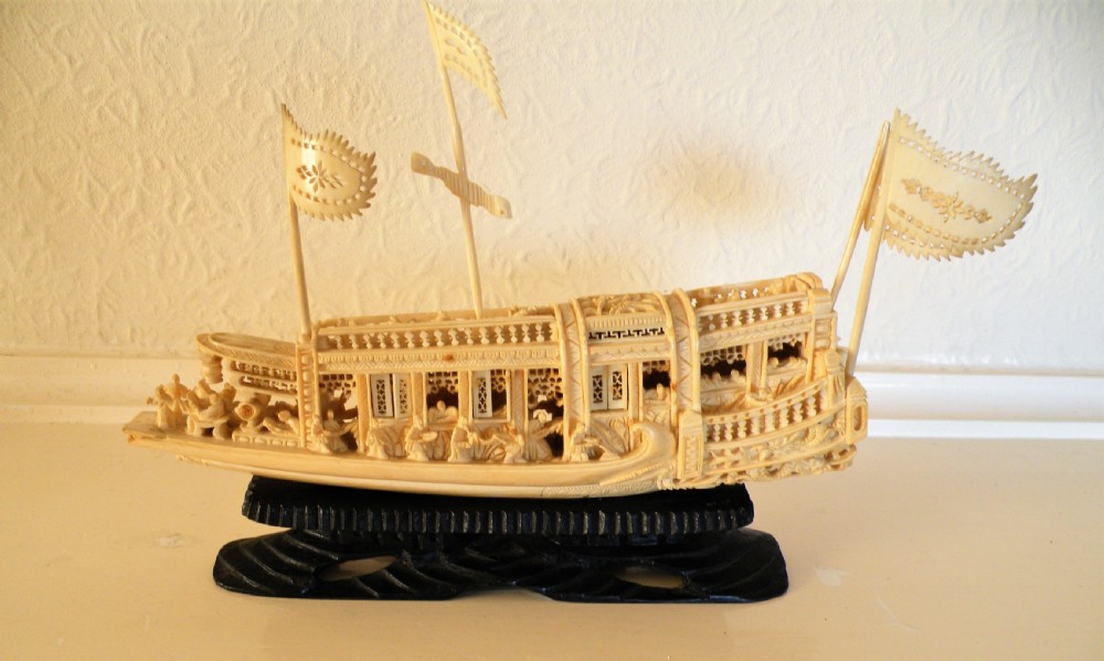 a good 19th century carved ivory model of a chinese junk