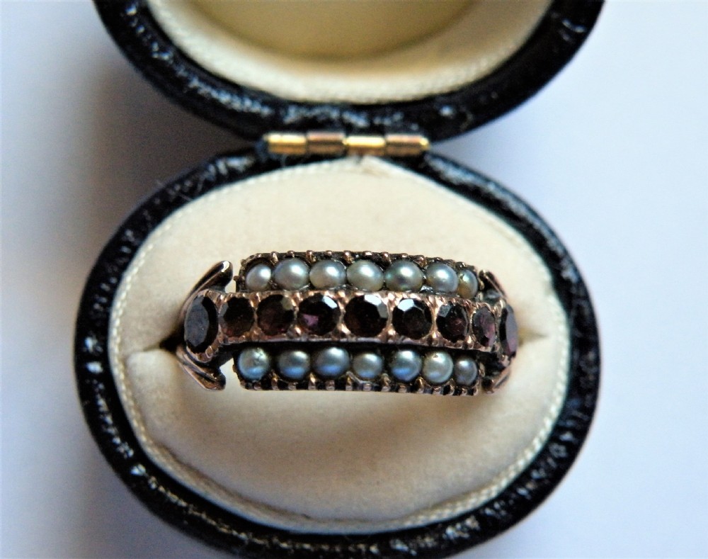 a georgian rose gold garnet and pearl ring