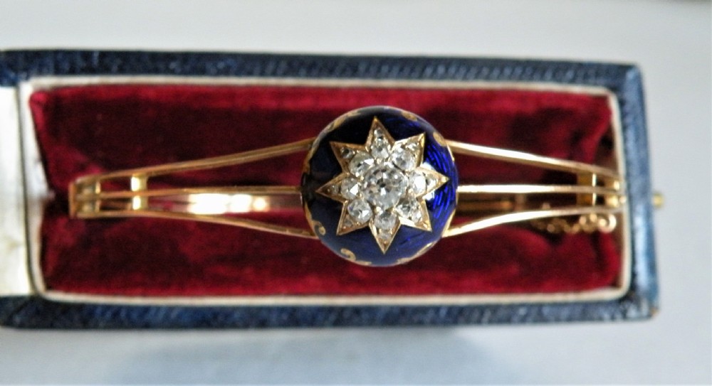 a lovely victorian gold enamel and diamond bangle