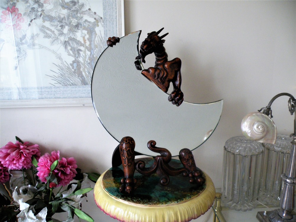 a large highly decorative 19th century chinese dragon easel mirror