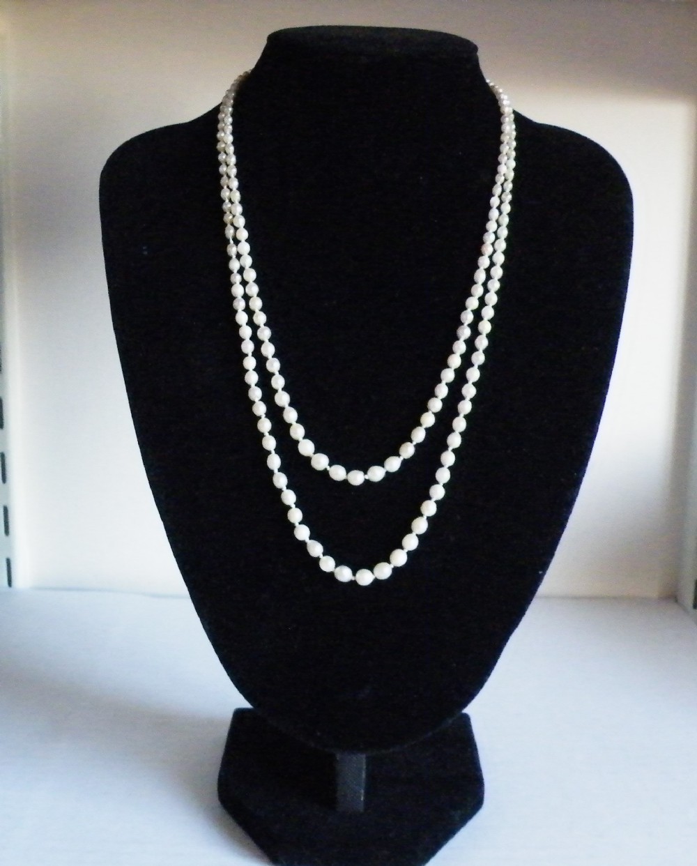a 19th century double graduted natural pearl necklace with a diamond set clasp
