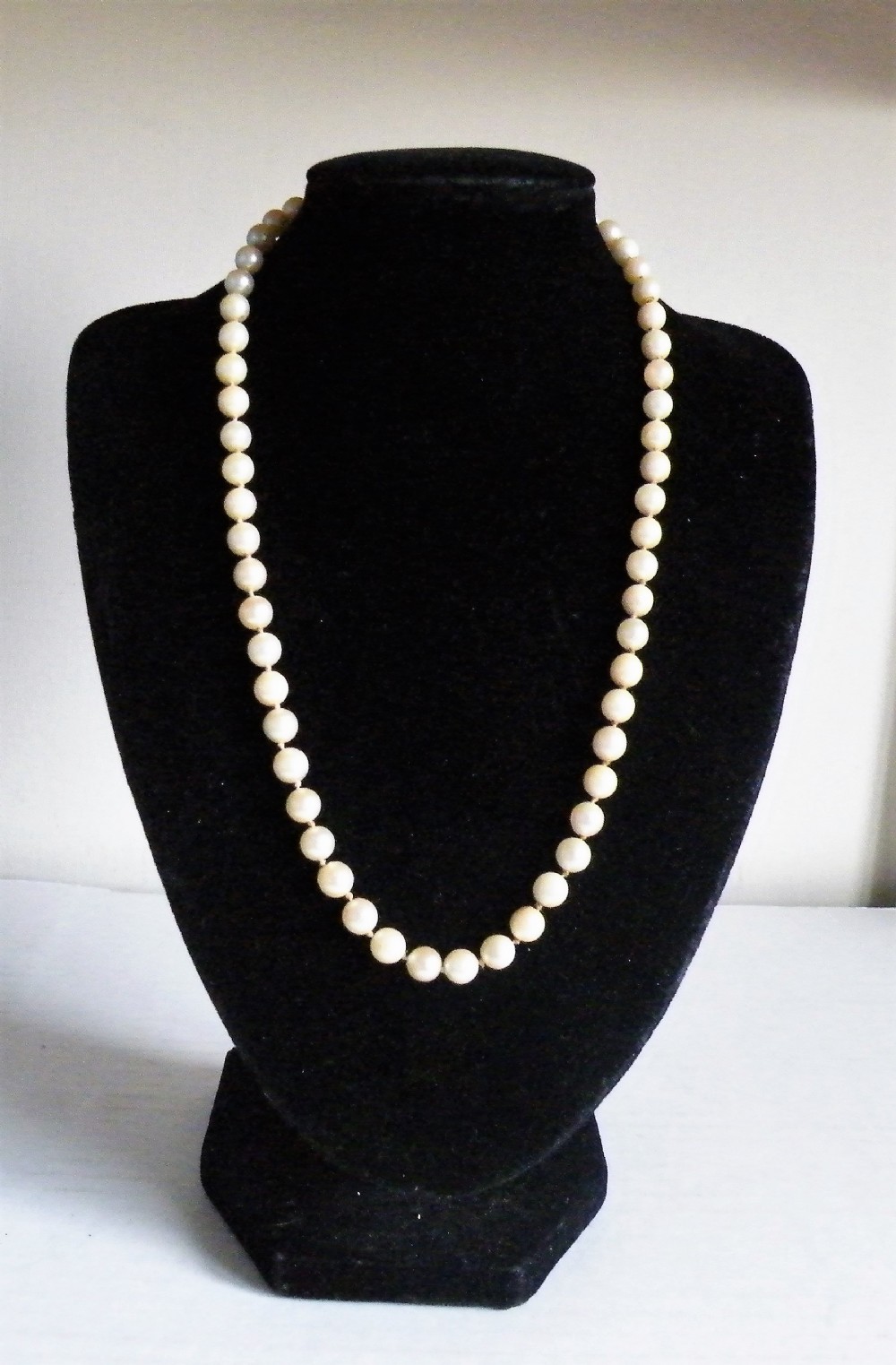a 1940s vintage cultured pearl necklace with a silver clasp 18 inches