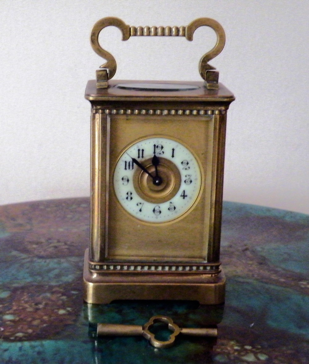 a 19th century brass carriage clock