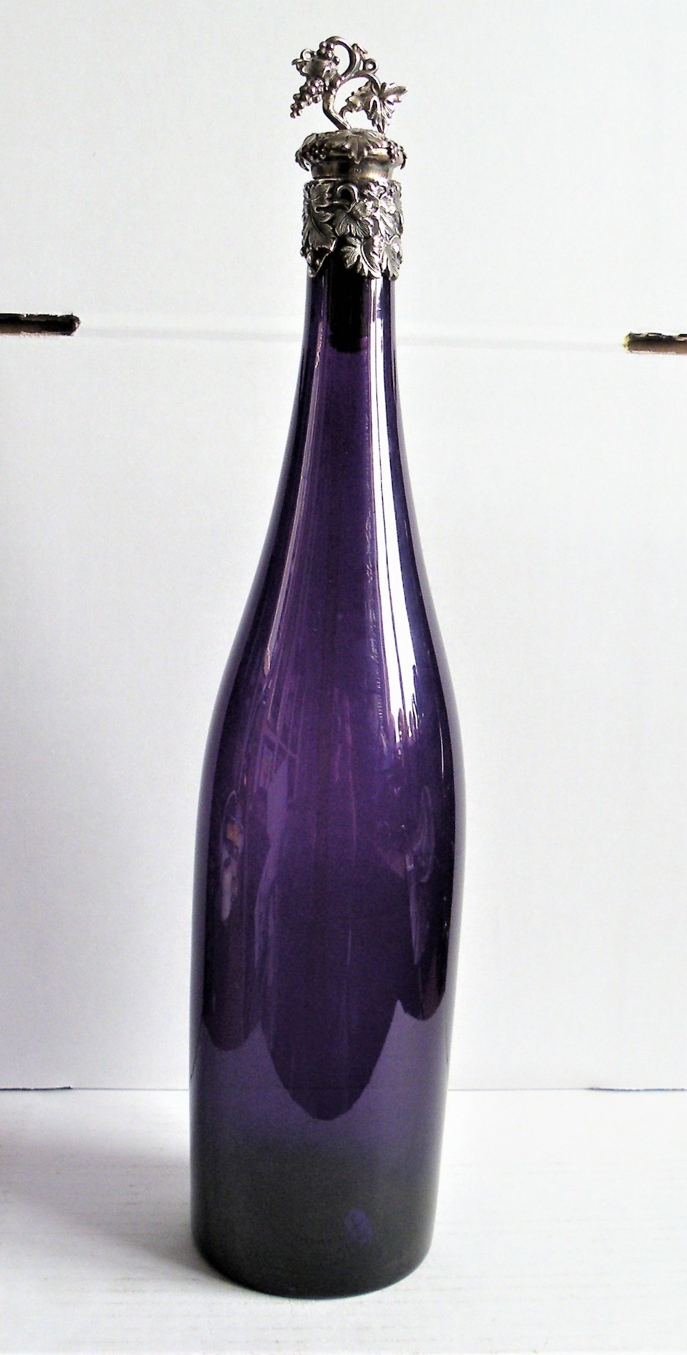 a lovely early victorian silver mounted amethyst glass decanter