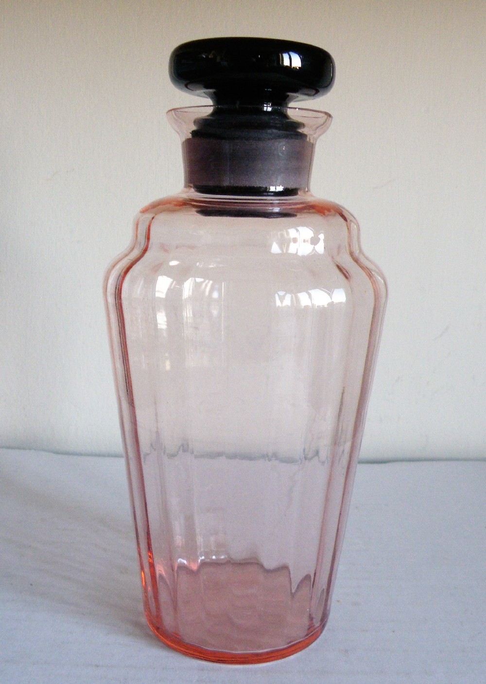 an art deco pink and black glass cocktail shaker decanter