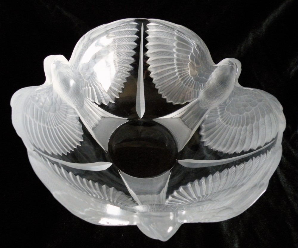 a good art deco glass bowl moulded with three birds with outstretched wings circa 1930