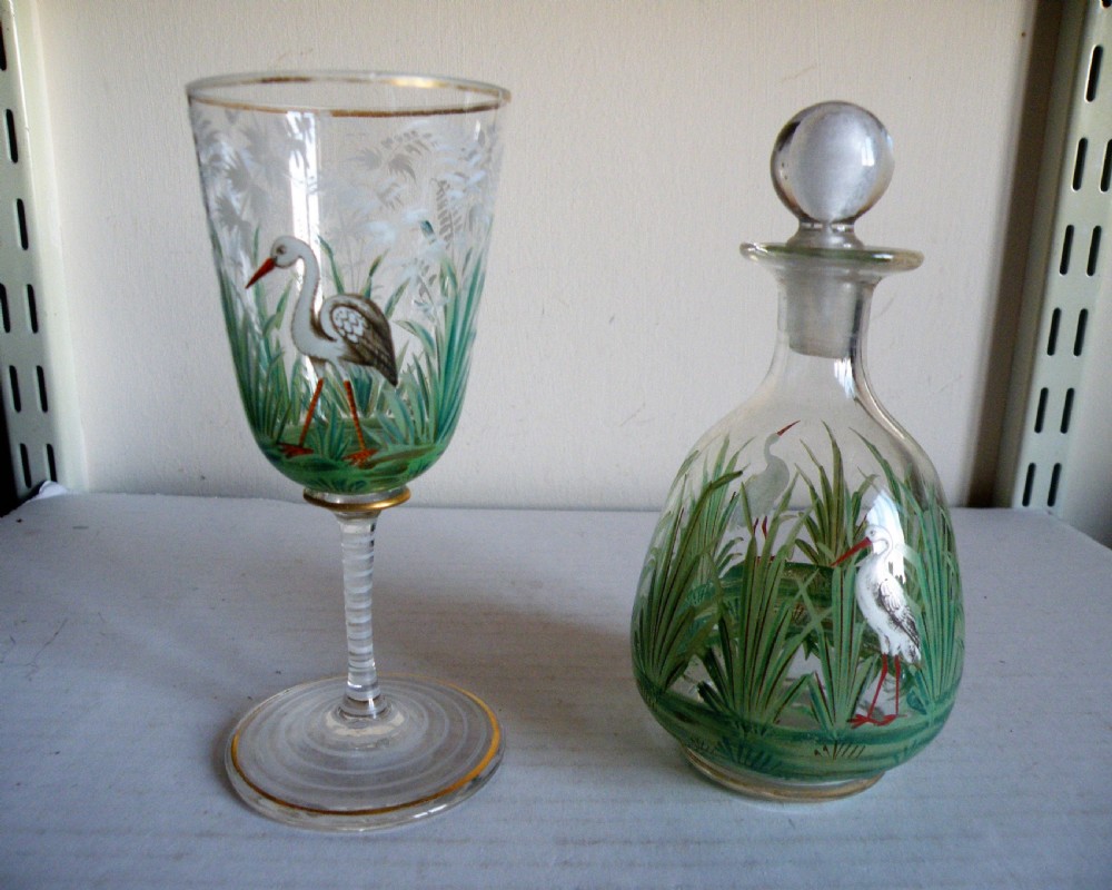 a nice victorian enamelled glass carafe and matching drinking goblet