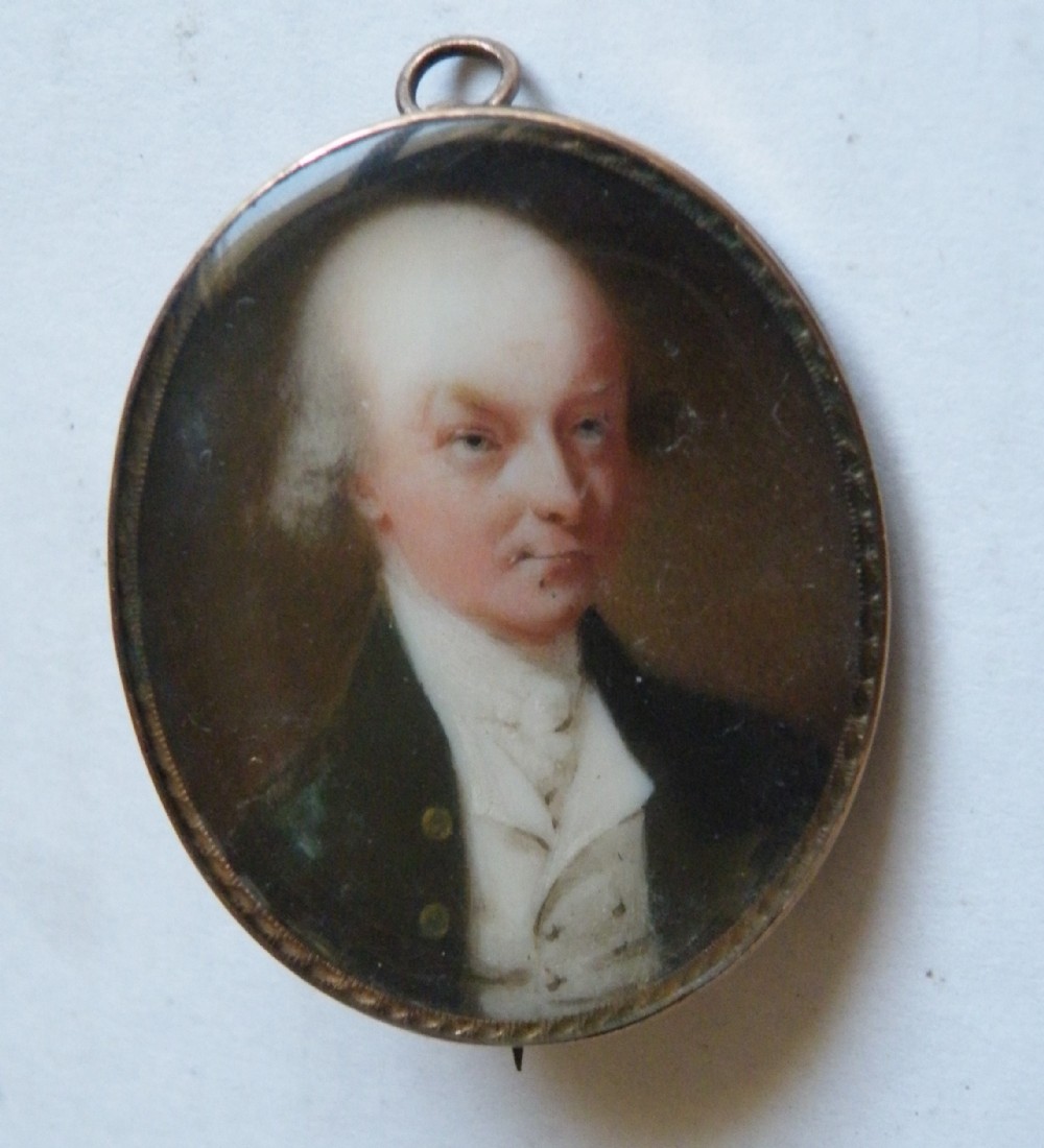 a good georgian portrait miniature pendant brooch of a gentleman set in gold frame