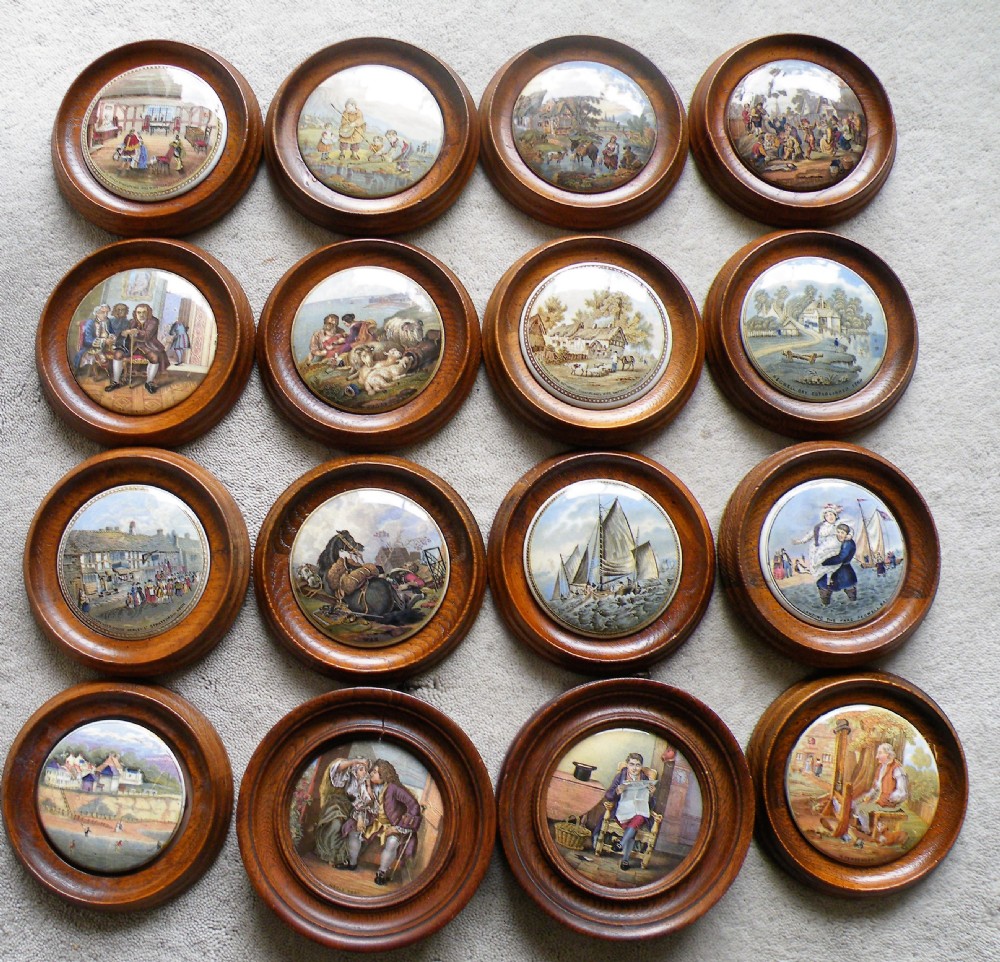 collection of 16 victorian pottery pratt ware pot lids all wood framed