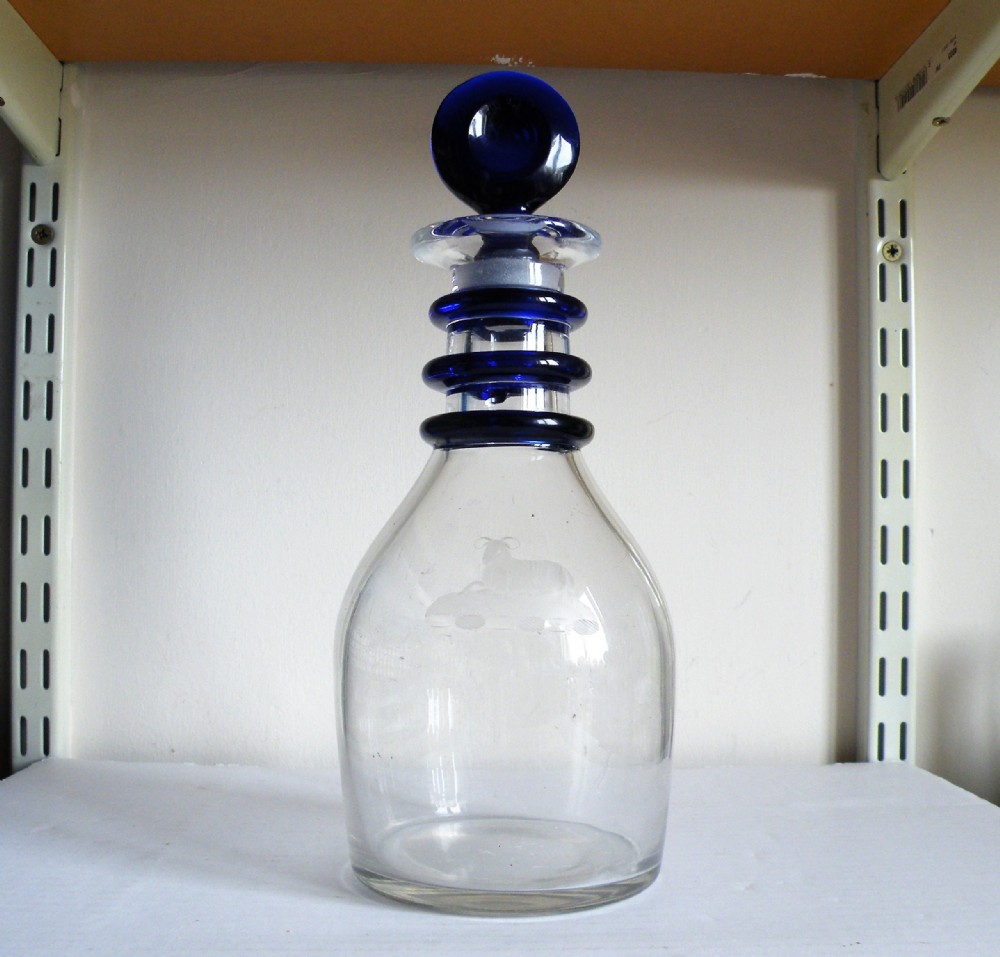 a very rare georgian engraved decanter with blue neck rings and blue stopper