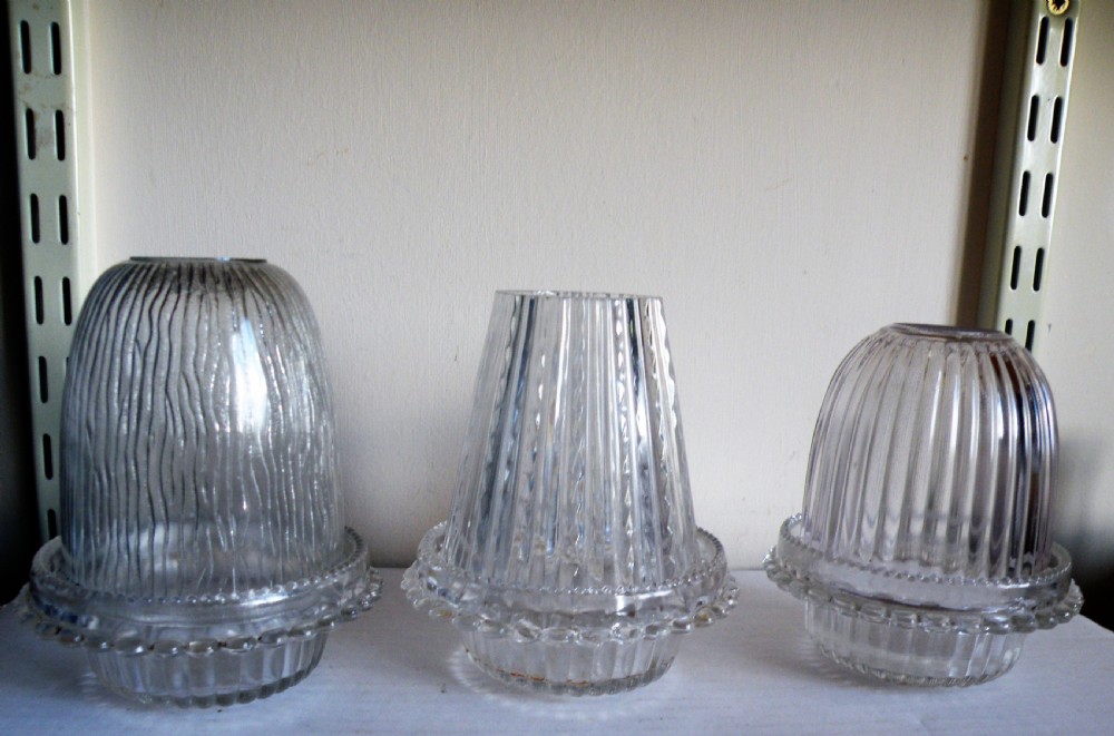 three antique glass nightlights on sclarke bases