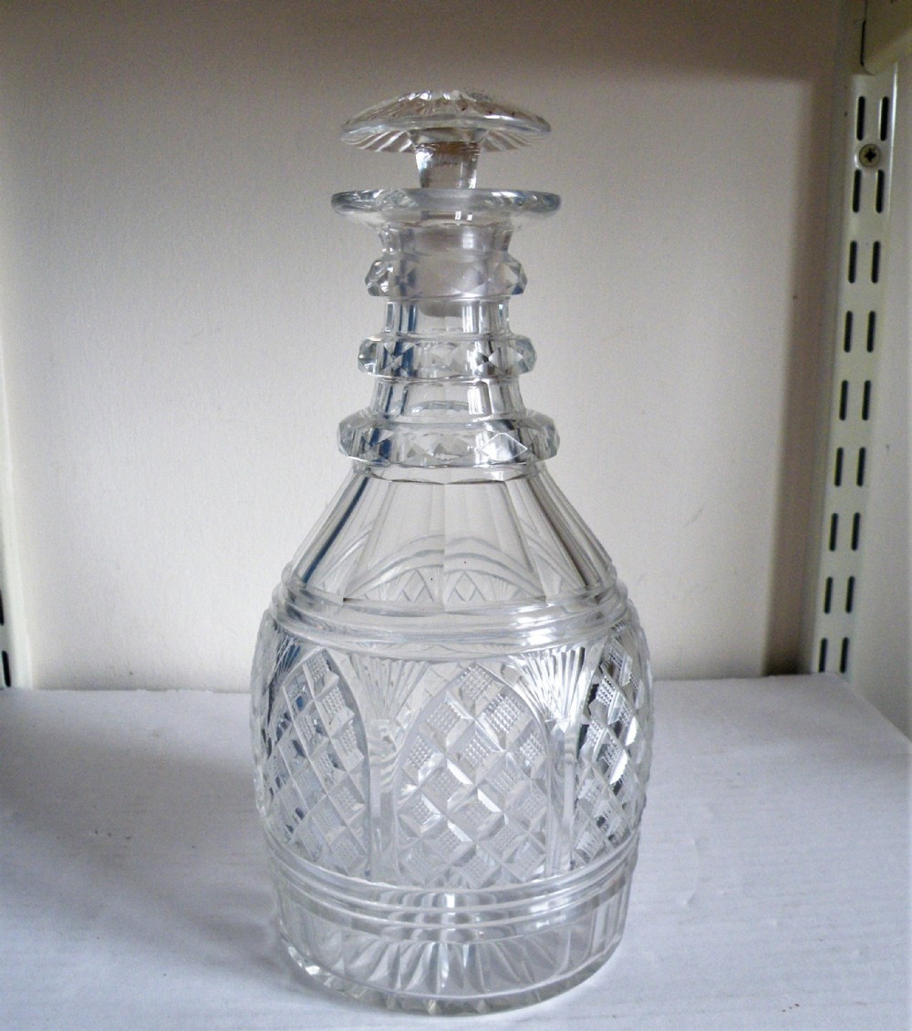 a quality georgian cut glass decanter with three facet cut neck rings