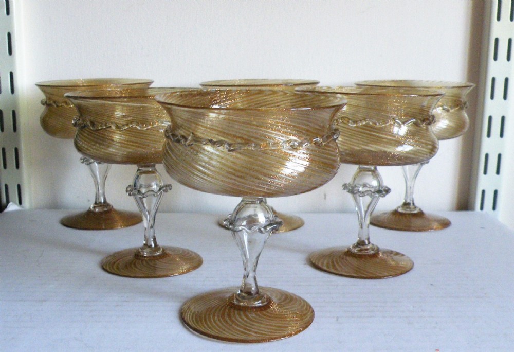 a good set of six 19th century venetian aventurine glass champagne coups