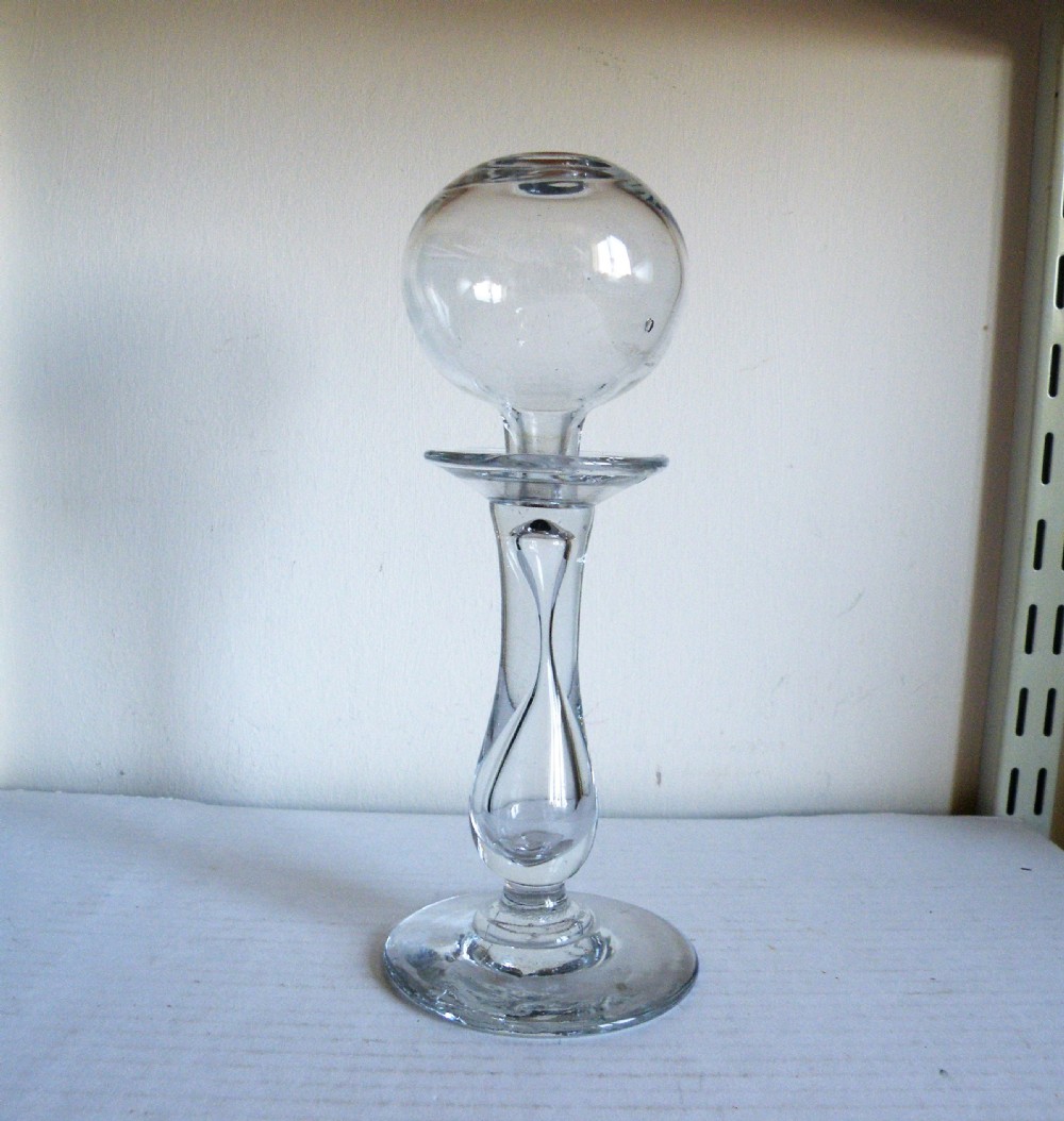 a 19th century glass lace makers lamp