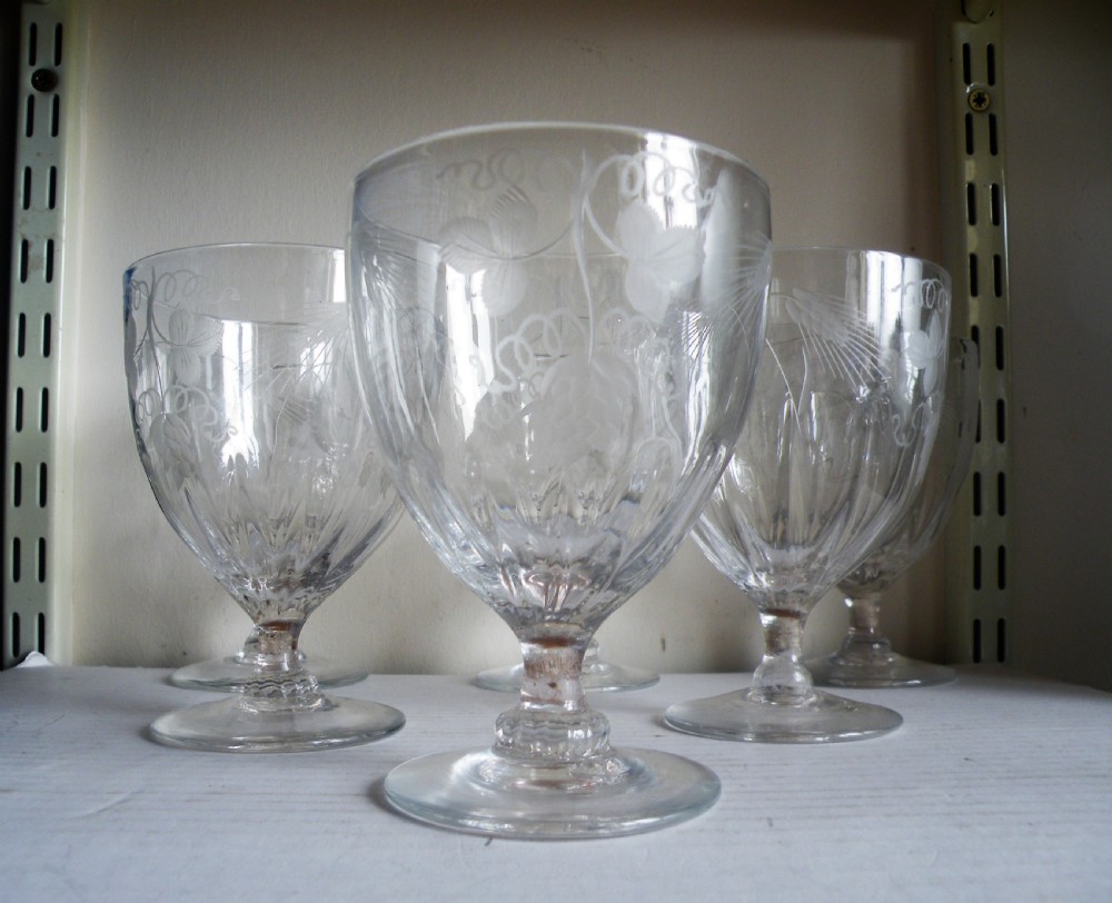 a nice handmade antique set of six engraved glass goblets