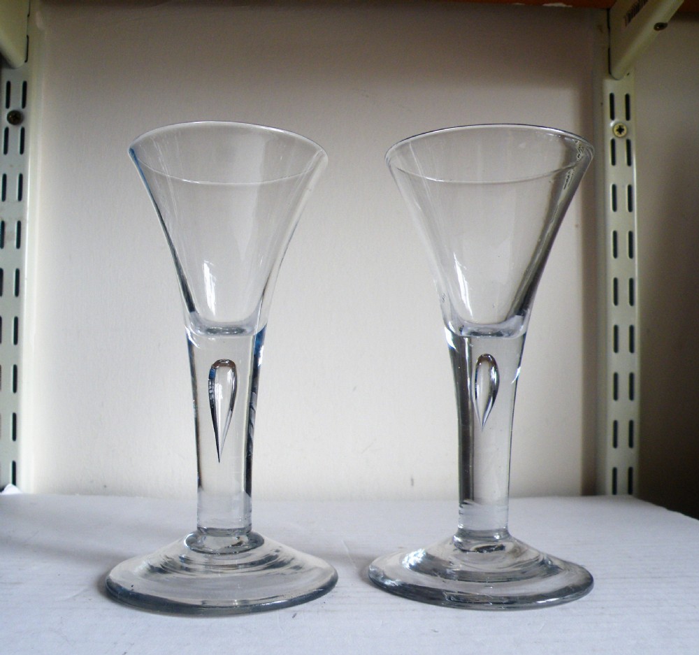 a sturdy pair of 18th century drawn stem wine glassesa sturdy pair of 18th century drawn stem wine glasses
