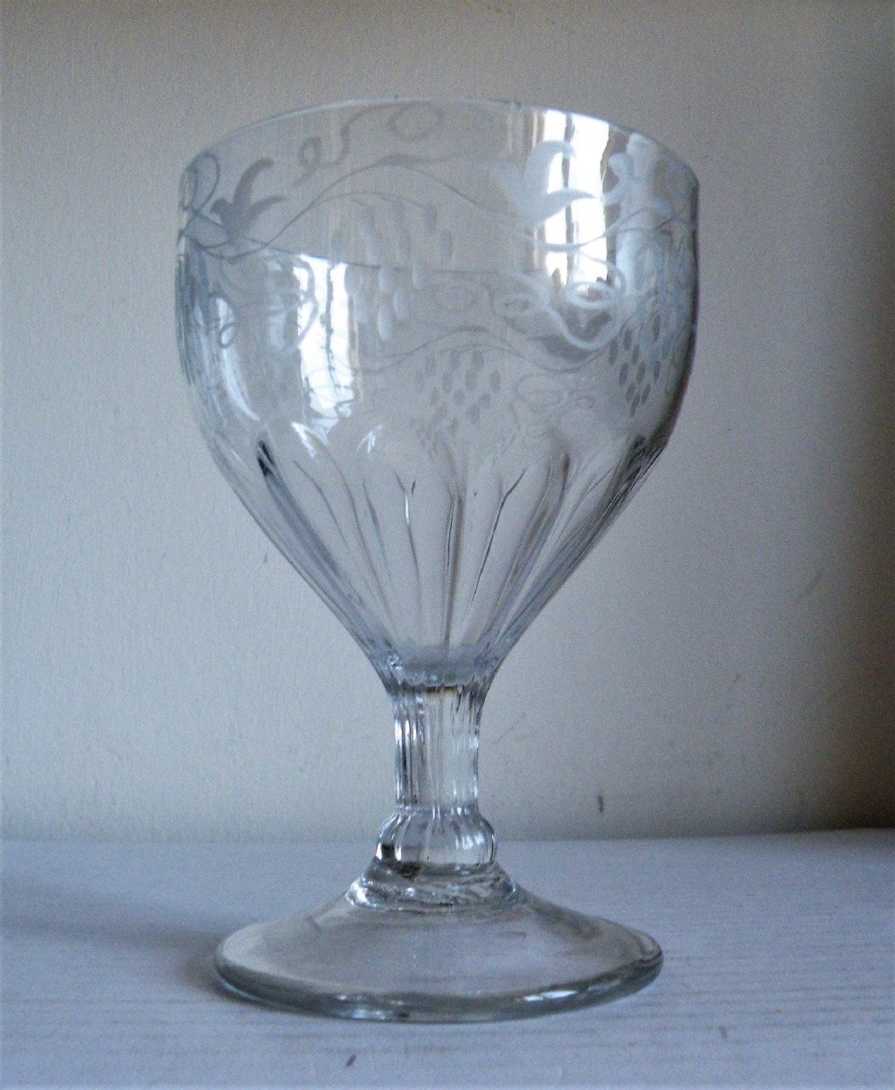 an 18th century engraved glass rummer