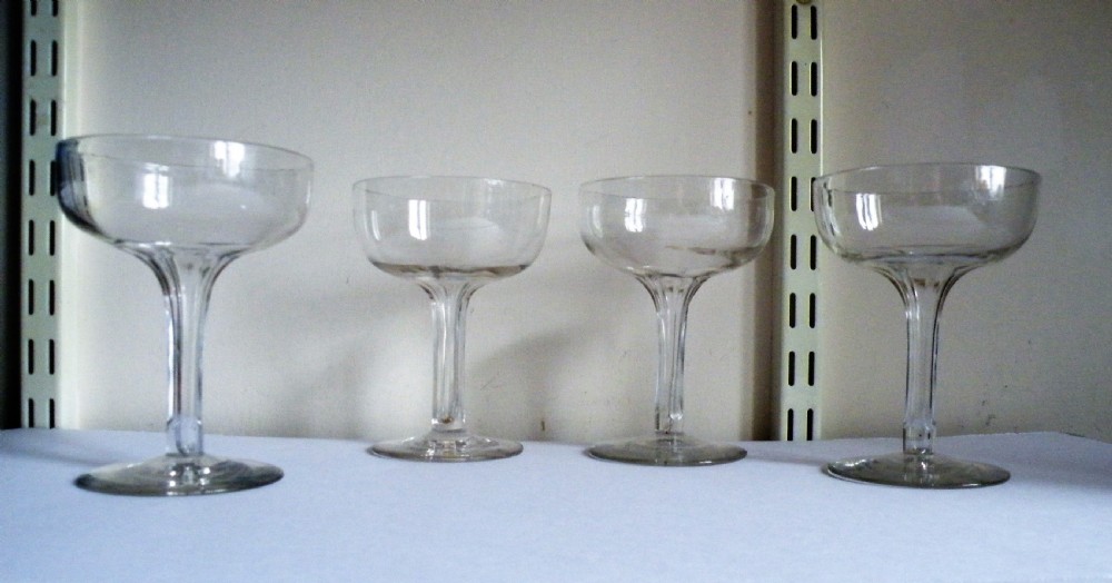 four antique victorian hollow stem champagne glasses coupes