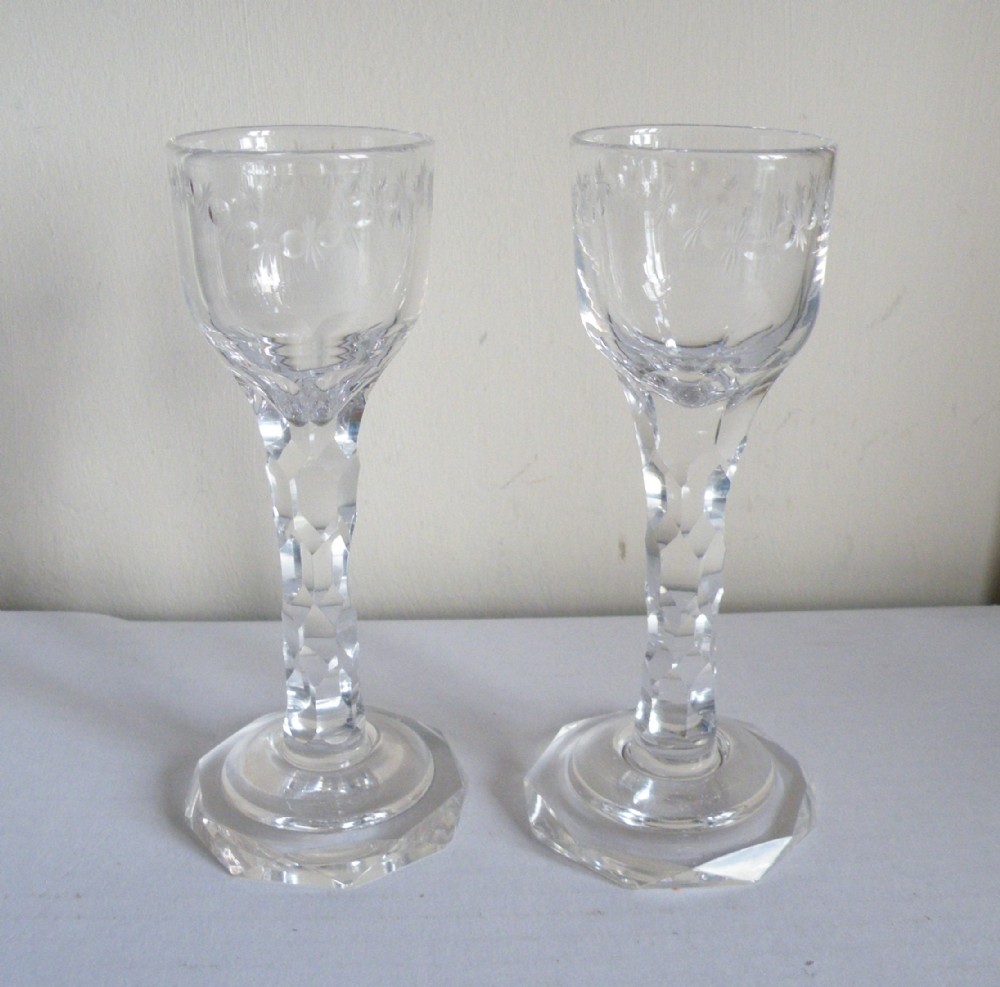 a pretty pair of georgian engraved wine glasses