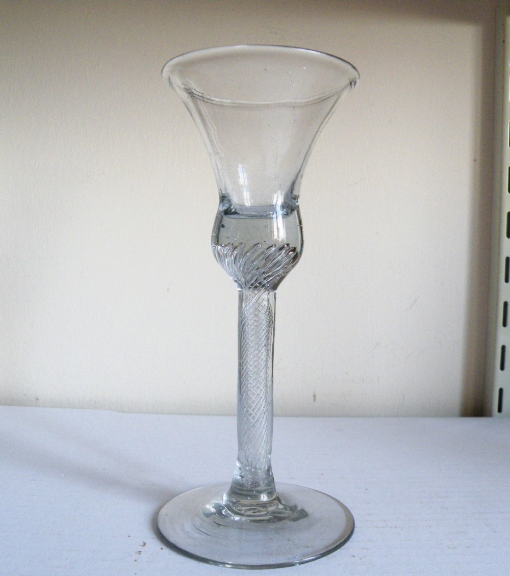 a tall 18th century air twist stem wine glass