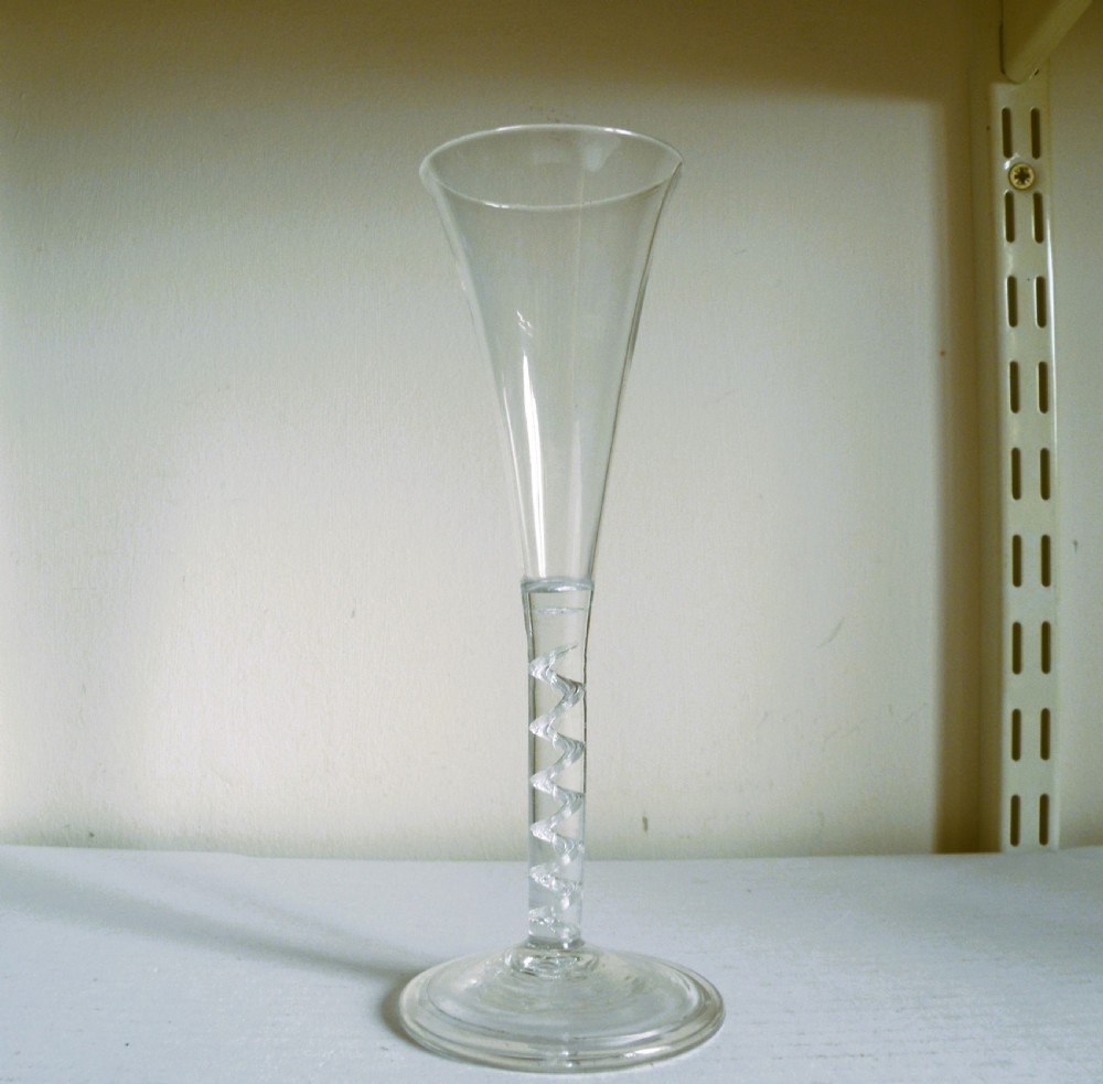 a tall mid 18th century air twist stem champagne glass