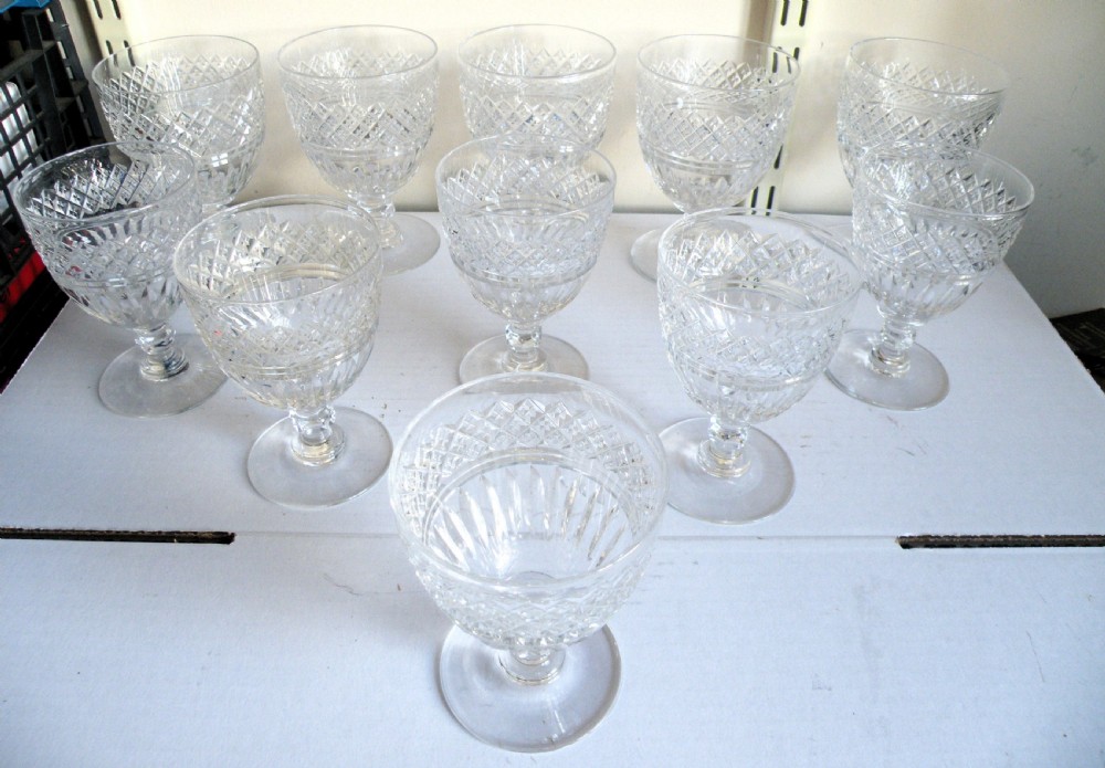 a quality part suite of 11 cut glass wine glasses