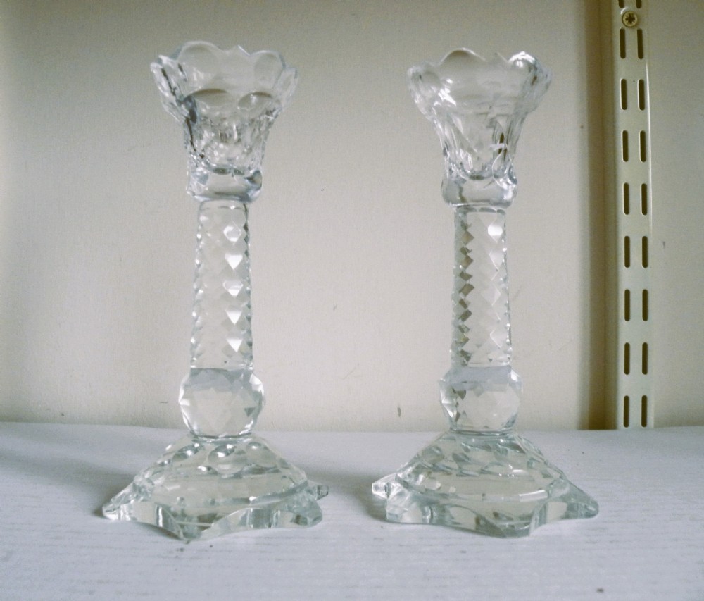 a very rare pair of small 19th century cut glass candelsticks