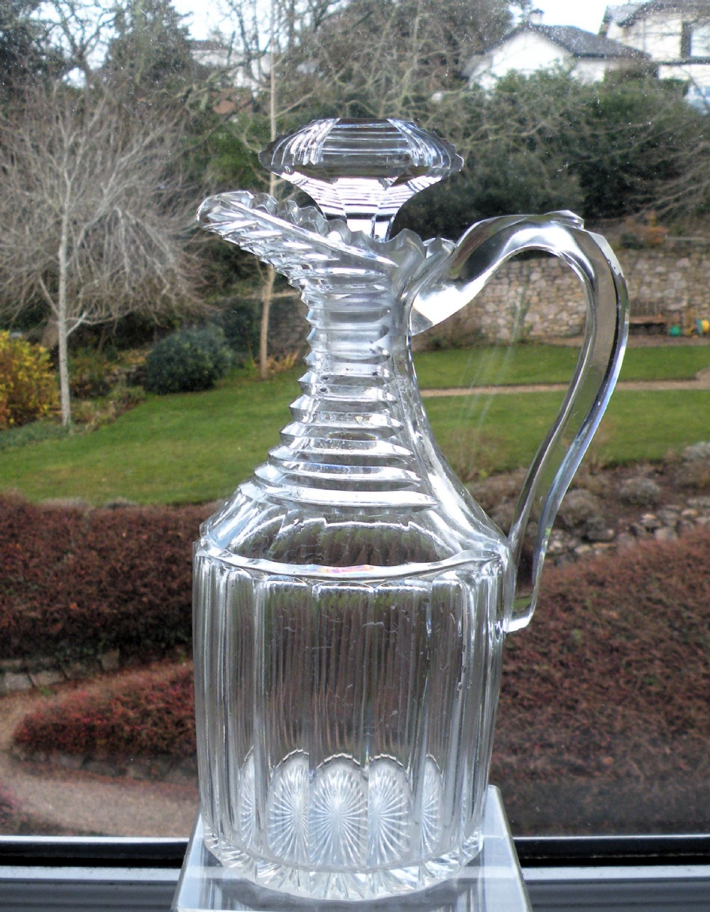 a good quality regency cut glass claret jug
