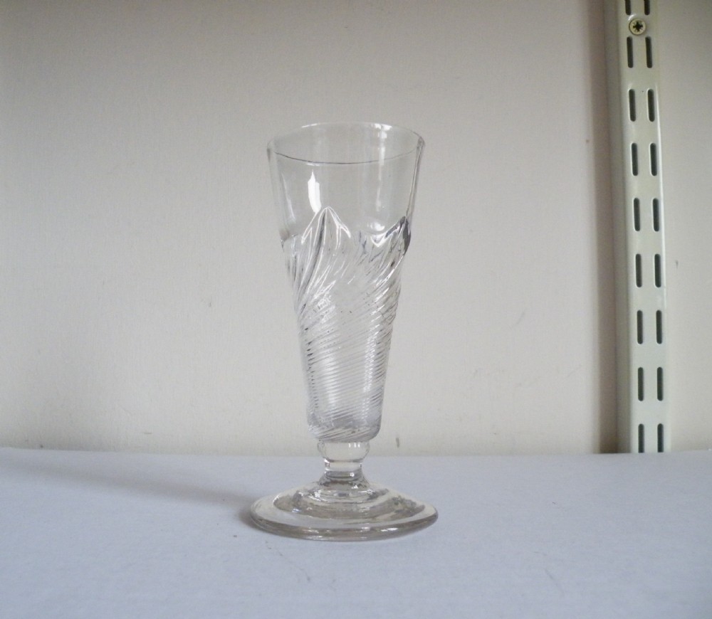 an early 18th century flamiform dwarf ale glass circa 1720