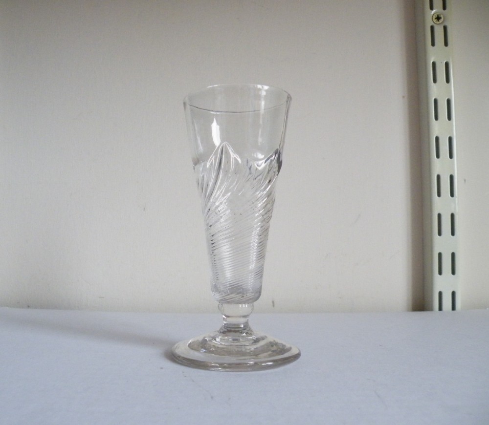 an early 18th century flamiform dwarf ale glass circa 1720