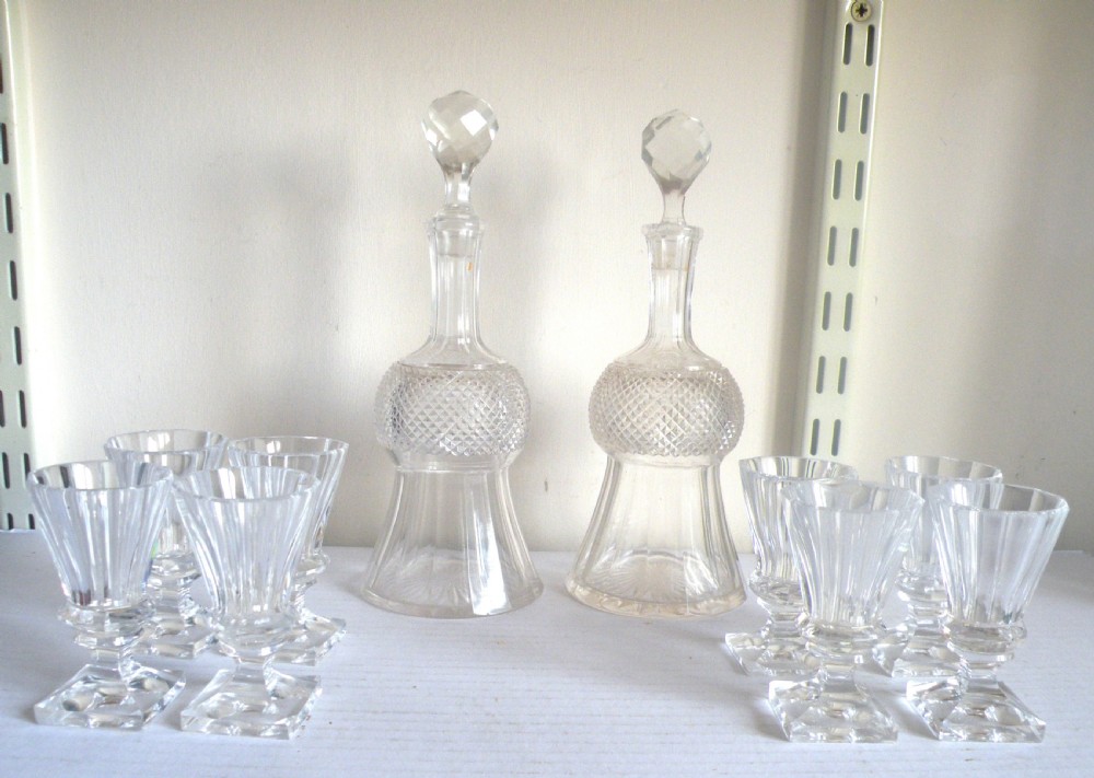 a 19th century thistle shape glass decanters and tots whisky set