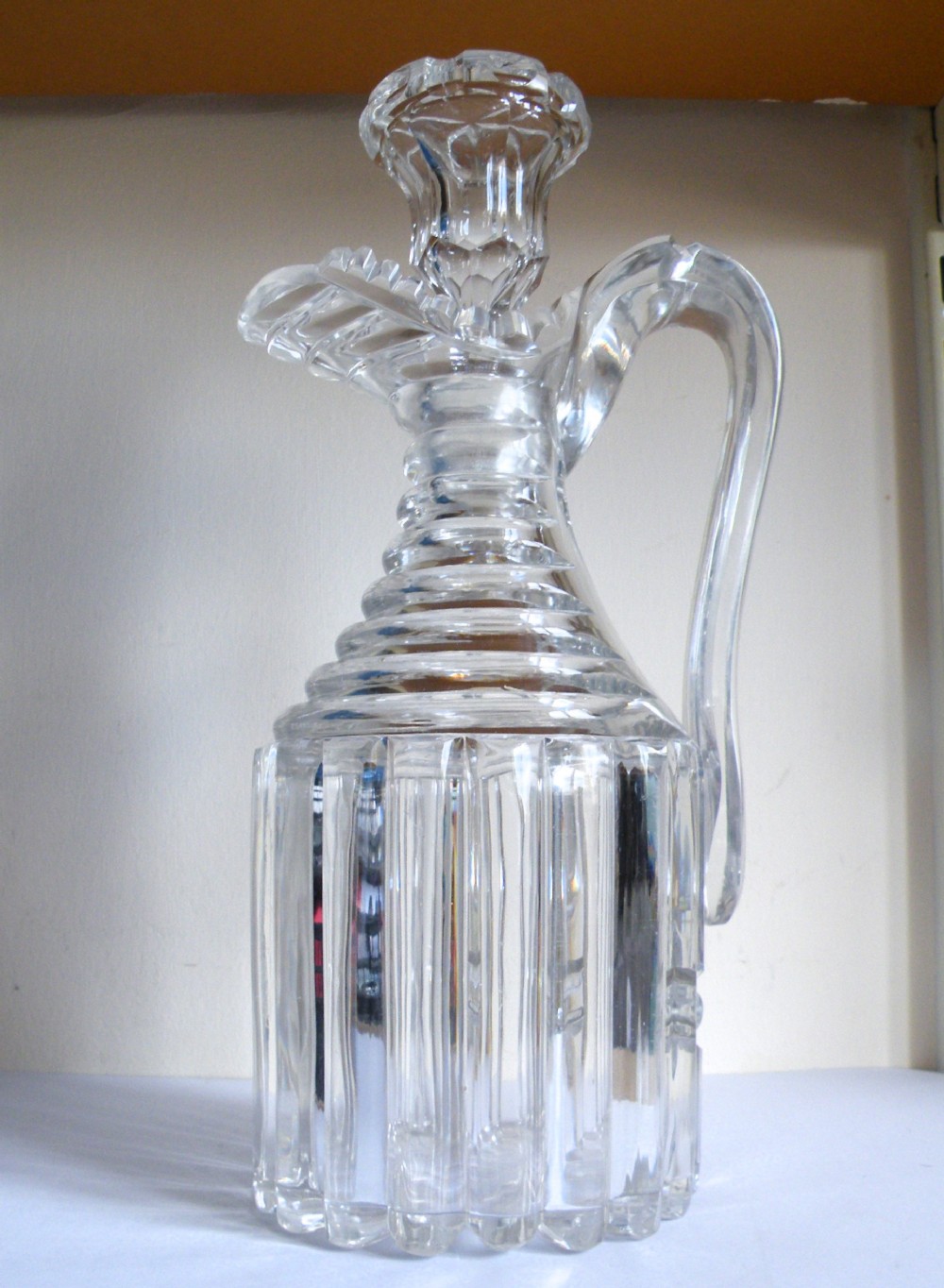 an exceptional regency pillar cut glass claret jug