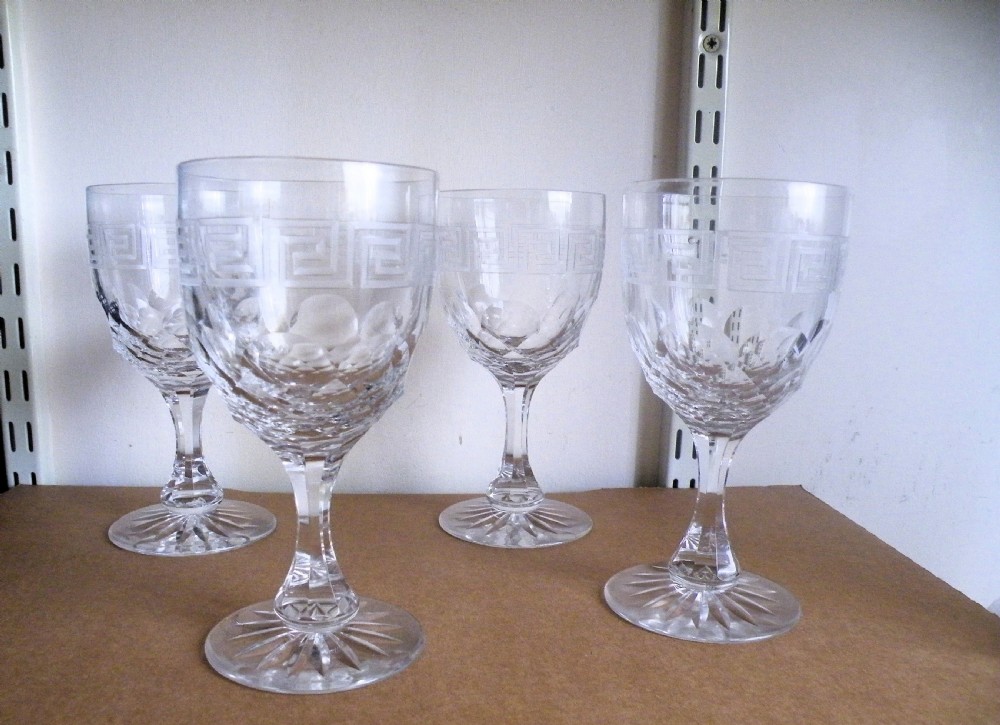 a lovely set of four victorian cut and engraved goblets