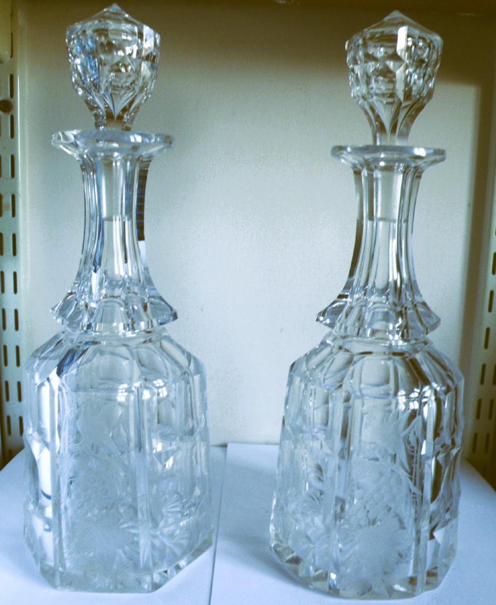 a good quality pair of 19th century cut and engraved decanters
